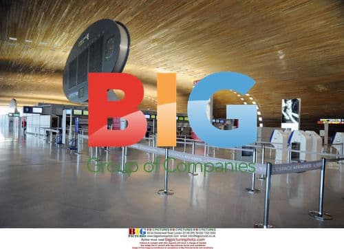 Passenger rests at Paris airport amid flight cancellations