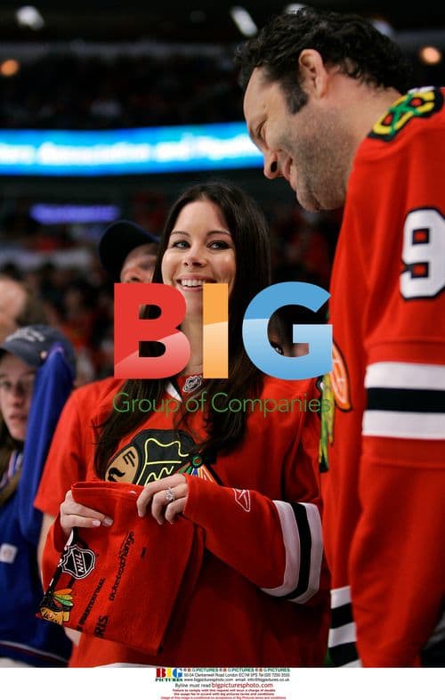 Vince Vaughn and Wife at Hockey Game