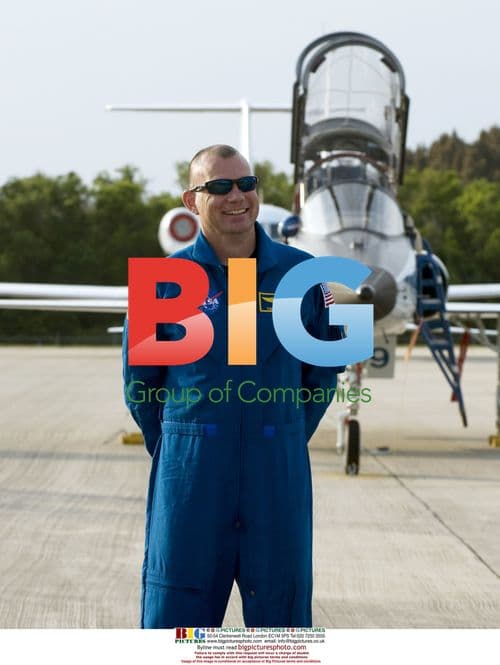 NASA's Discovery shuttle returns to facility