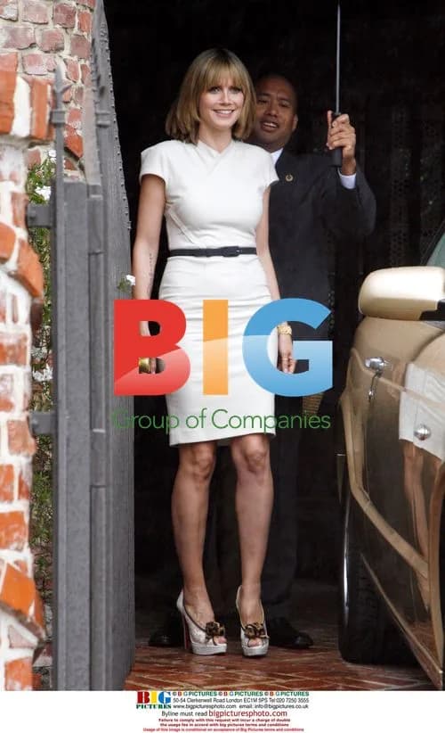 Heidi Klum Leaves in White Dress
