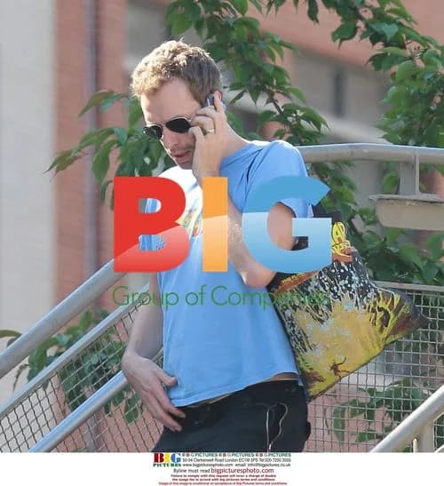 Chris Martin Strolls Through NYC With Obama Tee
