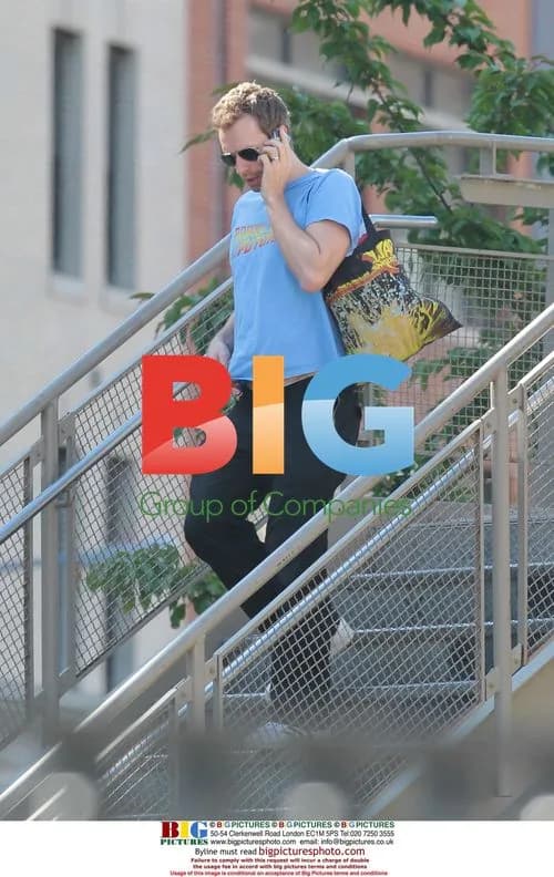 Chris Martin Walks Through NYC