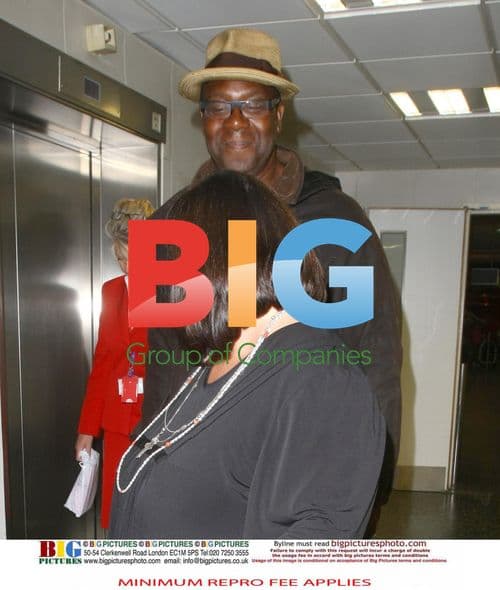 Lenny Henry and Dawn French Arrive from Caribbean Vacation