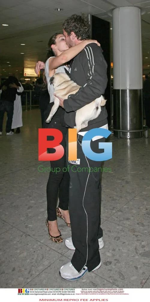 Kelly Brook Reunites with Boyfriend at Airport