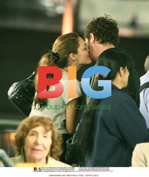Kelly Brook Arrives at Heathrow with Boyfriend