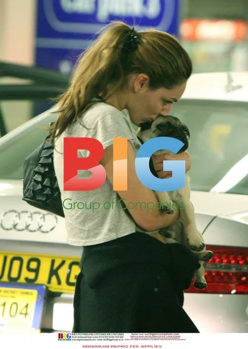 Kelly Brook Surprised at Heathrow