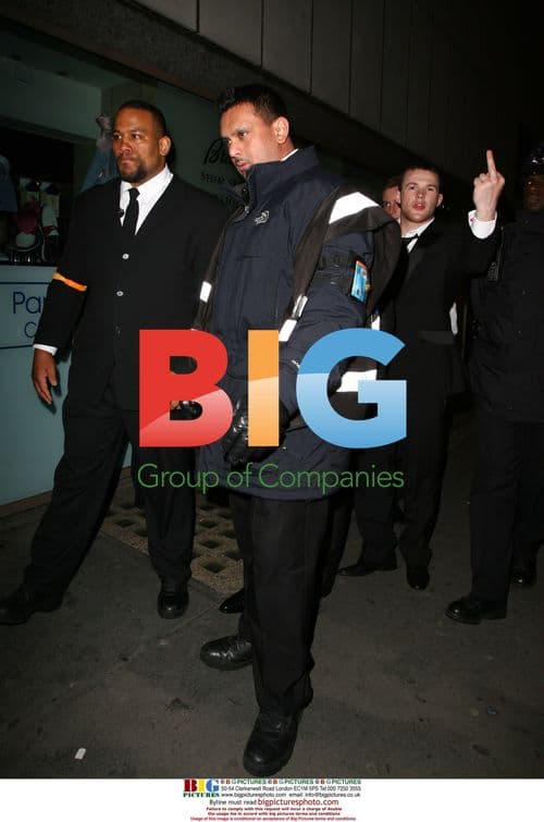 Footballers Rooney, Cole leave club with unconscious man