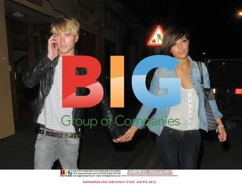 Frankie Sandford and Dougie Poynter Spotted Hand in Hand
