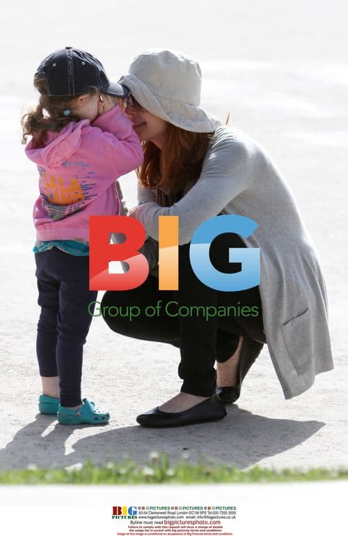 Marcia Cross visits park with kids