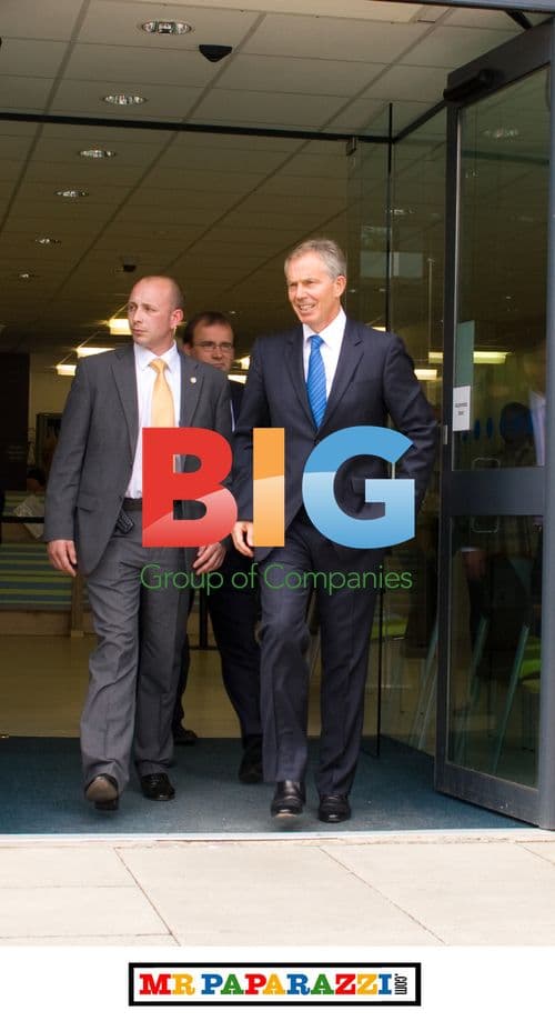 Tony Blair Exits Building in Harrow