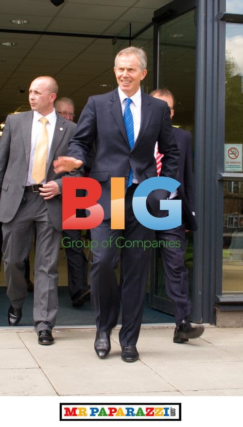 Tony Blair Exits Building in Harrow, UK