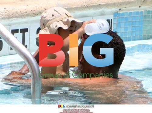Conrad Murray's Family Poolside in Miami