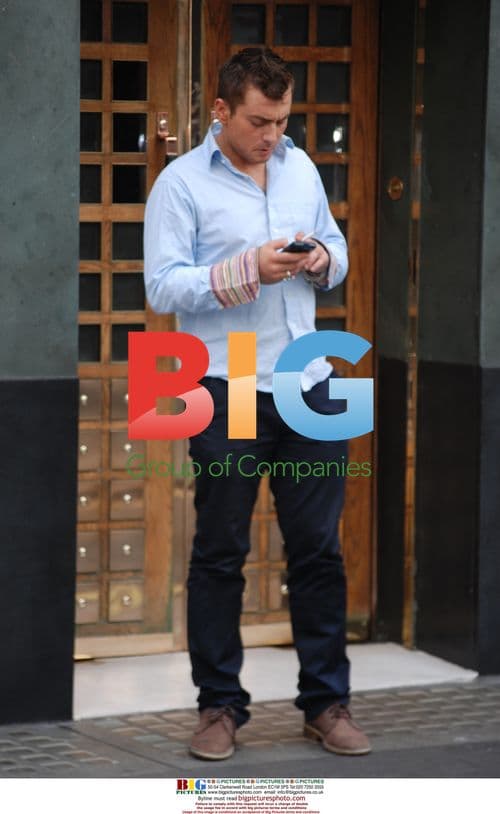 Paul Danan Smoking Outside the Ivy