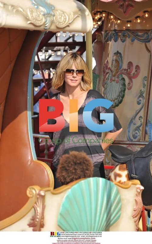 Heidi Klum and Seal take kids to theme park