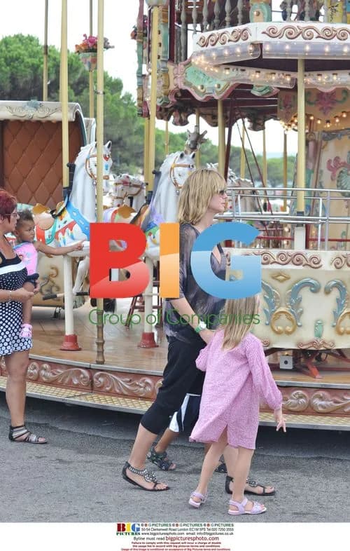 Heidi Klum and Seal with Kids at Theme Park