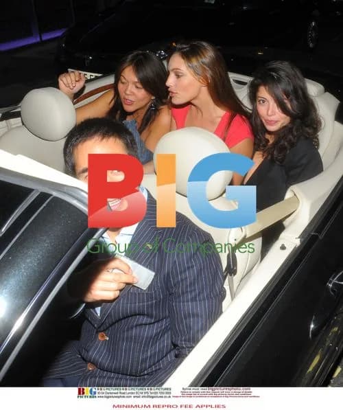 Kelly Brook enjoys a night out with friends