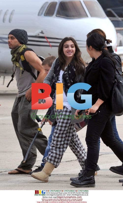 Madonna and children at Paris airport