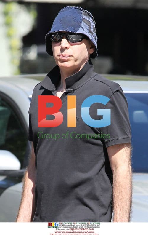 Joe Satriani and wife Rubina walk in Vancouver