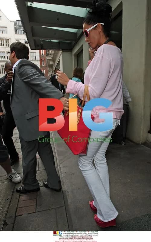 Katie Price Leaves Hotel with Son