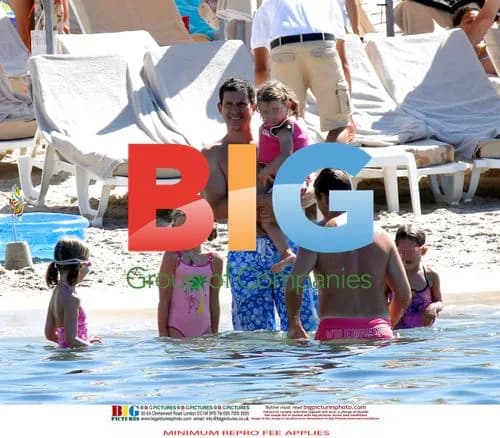 Tim Henman enjoys beach time with family in France