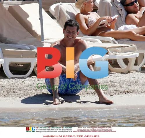 Tim Henman Enjoys Beach Time with Family in France