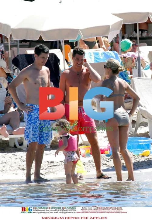 Tim Henman and family at the beach in France