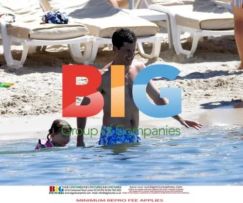 Tim Henman Enjoys Beach Trip with Family in France