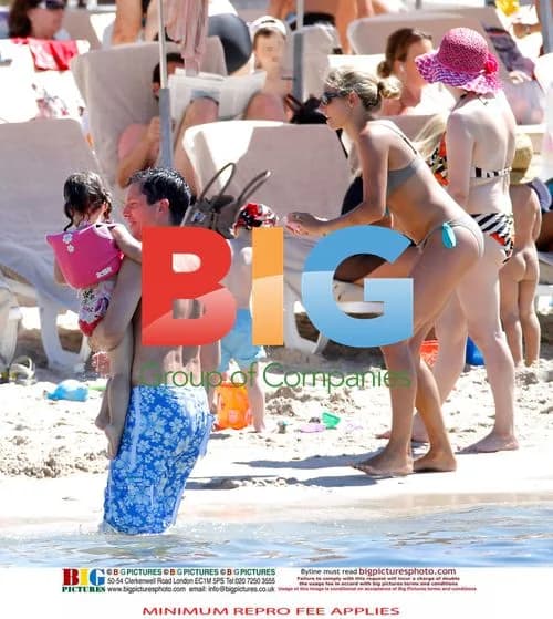 Tim Henman on Beach with Family