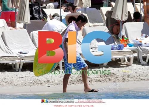 Tim Henman Enjoys Beach Trip with Family