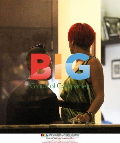 Rihanna Covers New Tattoo in NYC