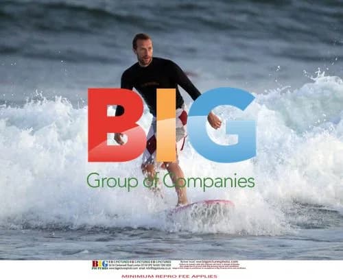 Chris Martin Surfing in Hamptons