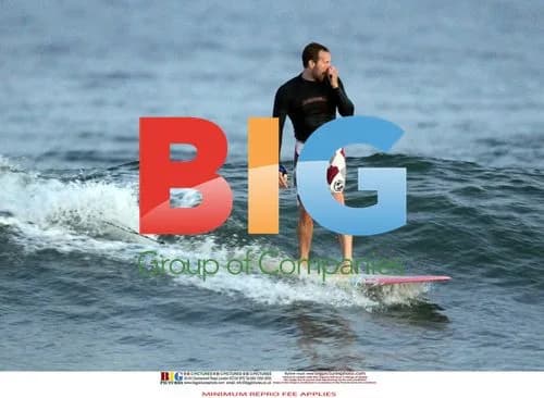 Chris Martin Surfing in the Hamptons