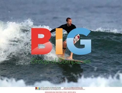 Chris Martin Surfing in the Hamptons
