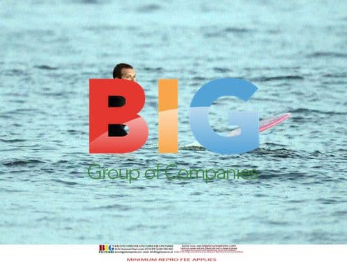 Chris Martin Surfing in Hamptons