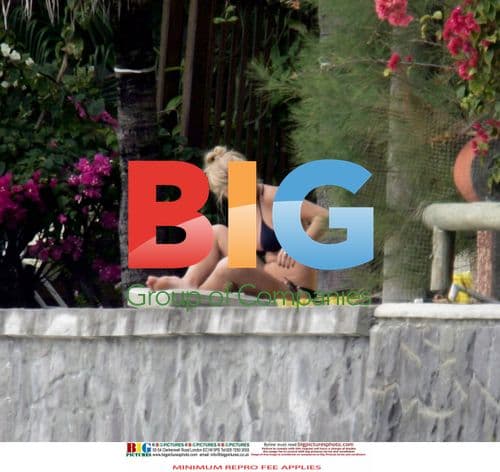 Chelsy Davy on Beach Vacation