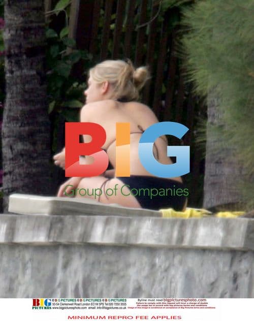 Chelsy Davy Relaxes on Beach Vacation