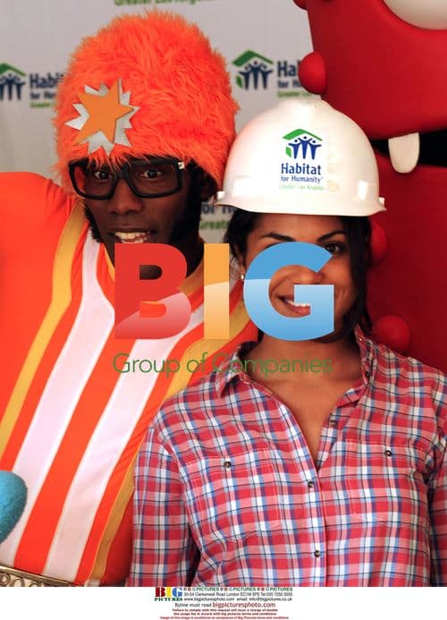 Monica Raymund volunteers for Habitat for Humanity