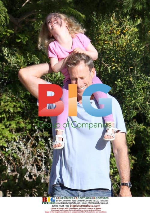 Marcia Cross' Twins Take a Walk with Dad