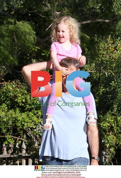 Marcia Cross' Twins Take a Walk with Dad