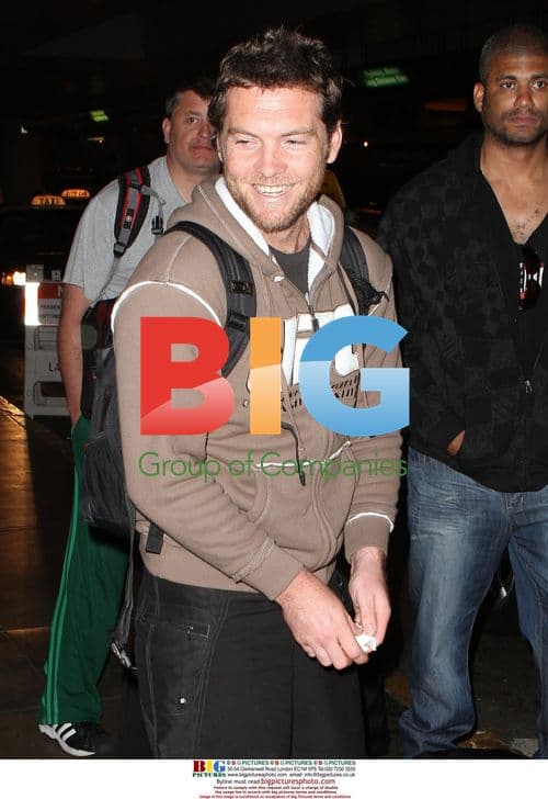 Sam Worthington Arrives at LAX