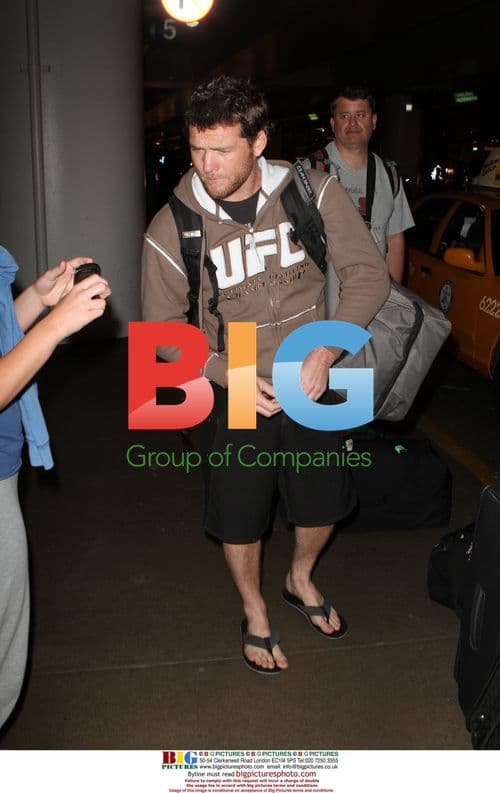 Sam Worthington Arrives at LAX