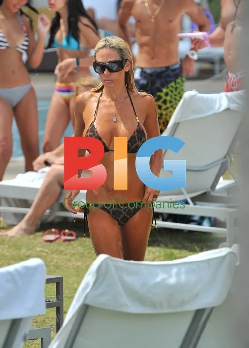 Shauna Sand and Daughters Poolside in Miami Beach