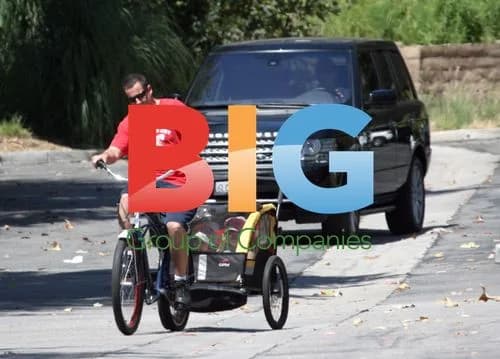 Adam Sandler Rides Bike with Kids
