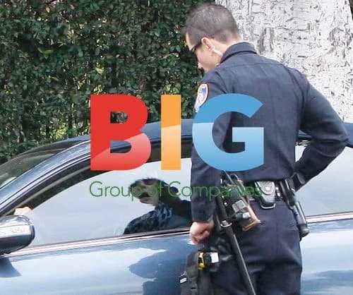 Katie Holmes Talks to Police Officer After Gym