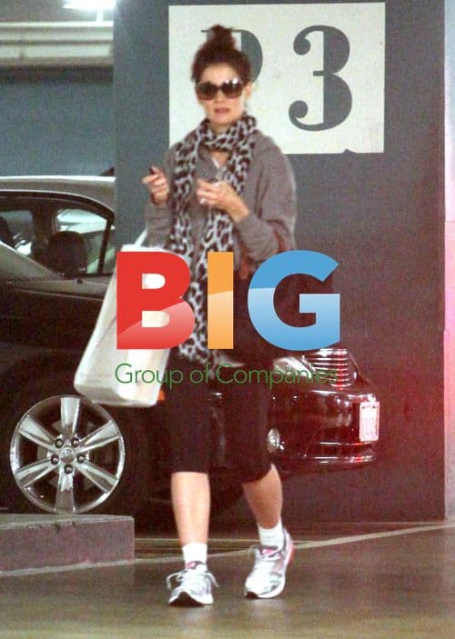 Katie Holmes Gets Police Escort Home