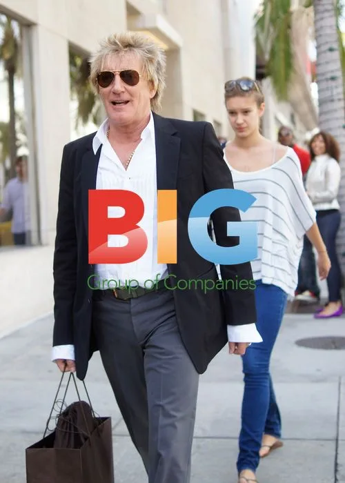 Rod Stewart shops with friend at Gucci