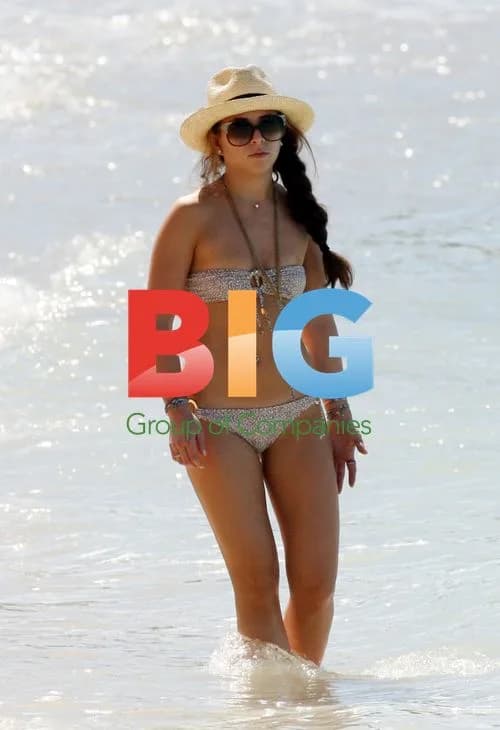 Chloe Green Relaxes on Barbados Beach