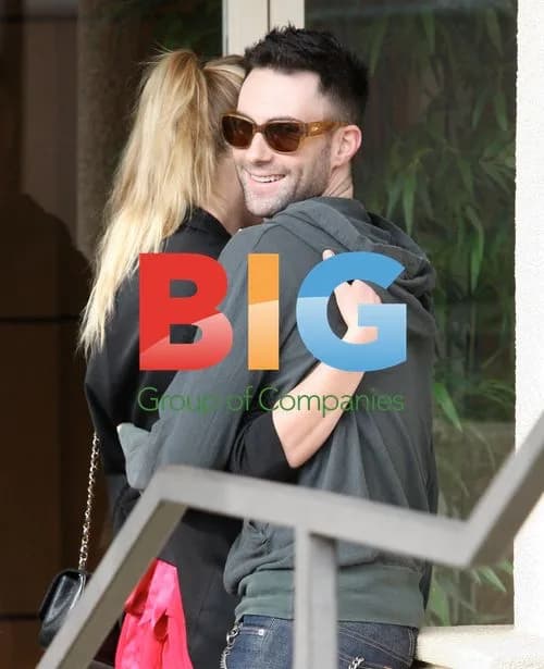 Adam Levine and girlfriend kiss in Brentwood