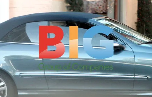 Katie Holmes Driving with Passenger