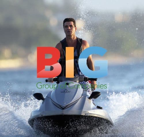 Simon Cowell Riding Jet-Ski at Sunset